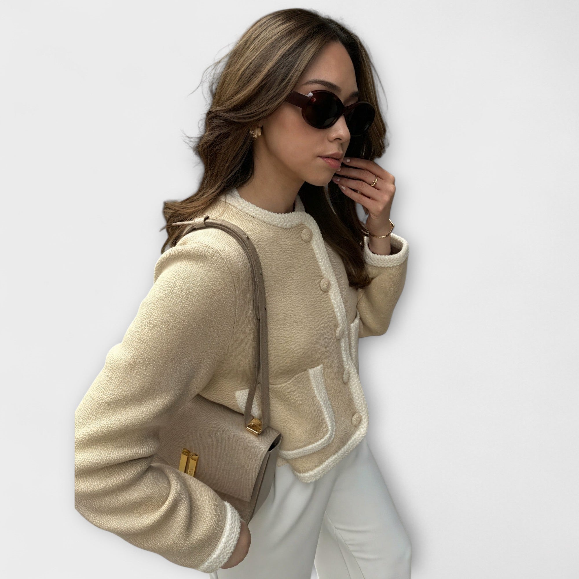 Classic cardigan with decorative pockets