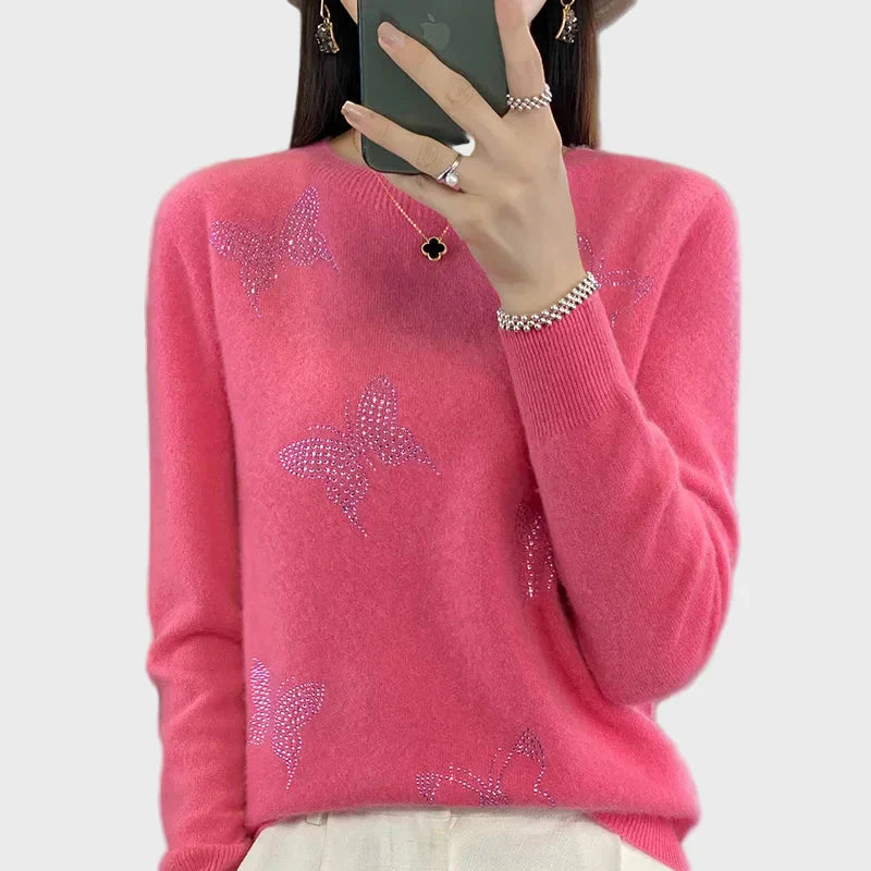 Knitted turtleneck with butterfly pattern