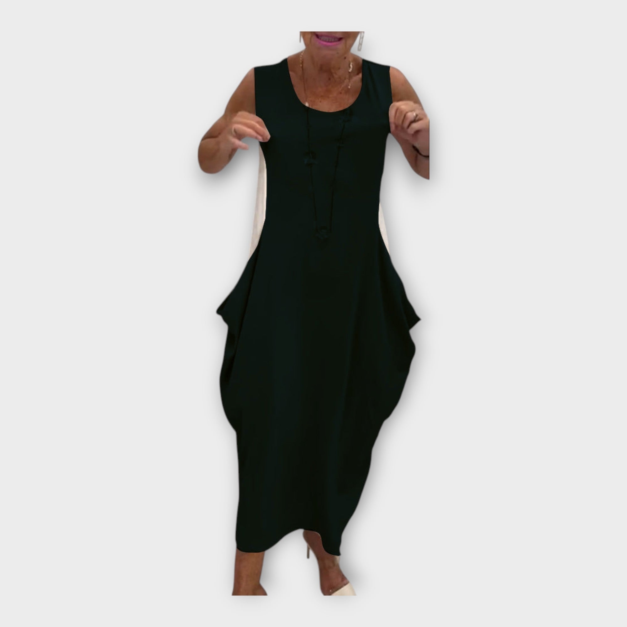 Light dress with a modern silhouette and pockets