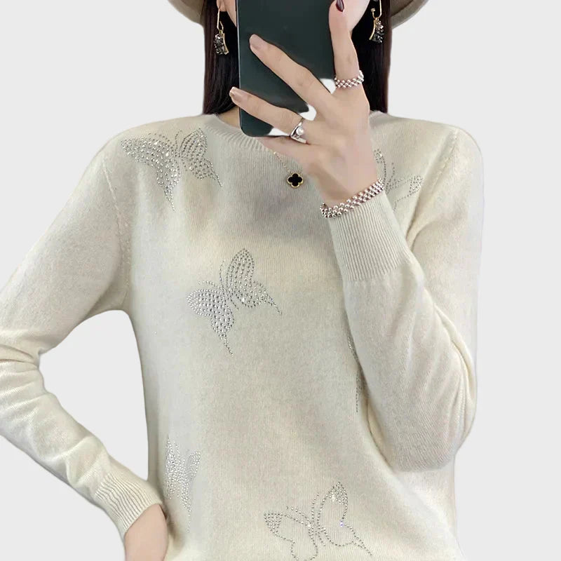 Knitted turtleneck with butterfly pattern