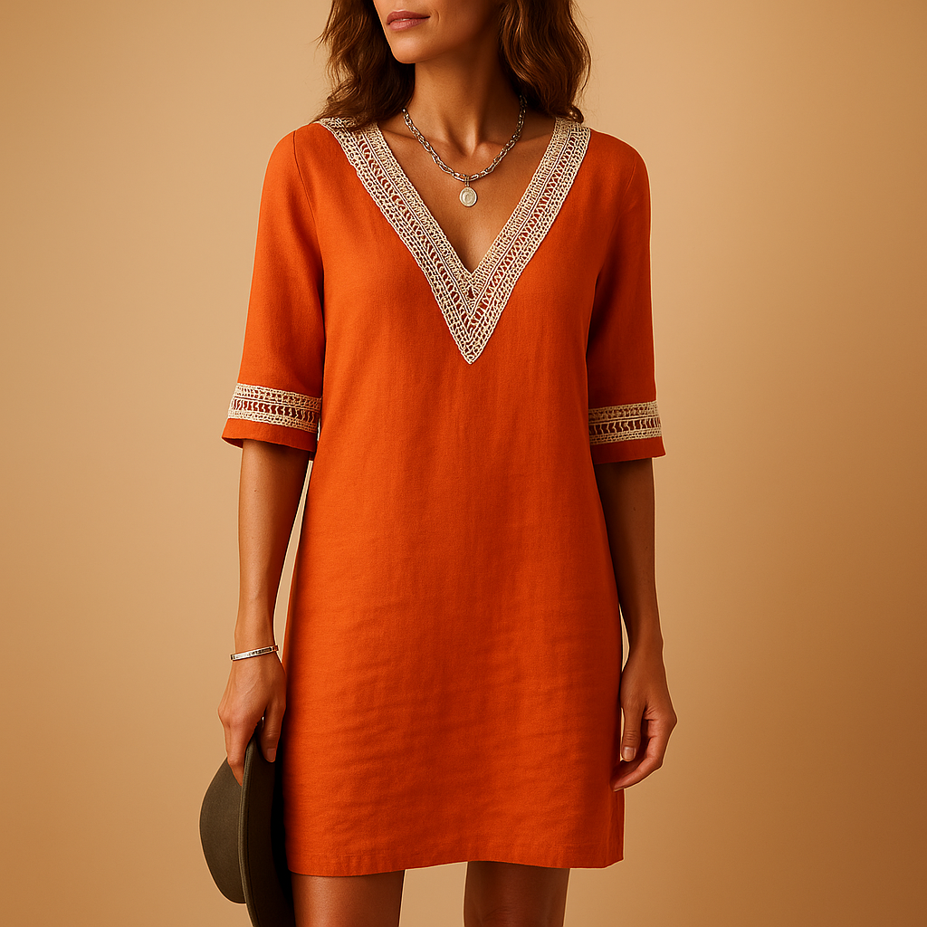 Lichte zomerjurk voor dames met V-hals en kanten details, perfect voor stranddagen en casual zomerlooks.