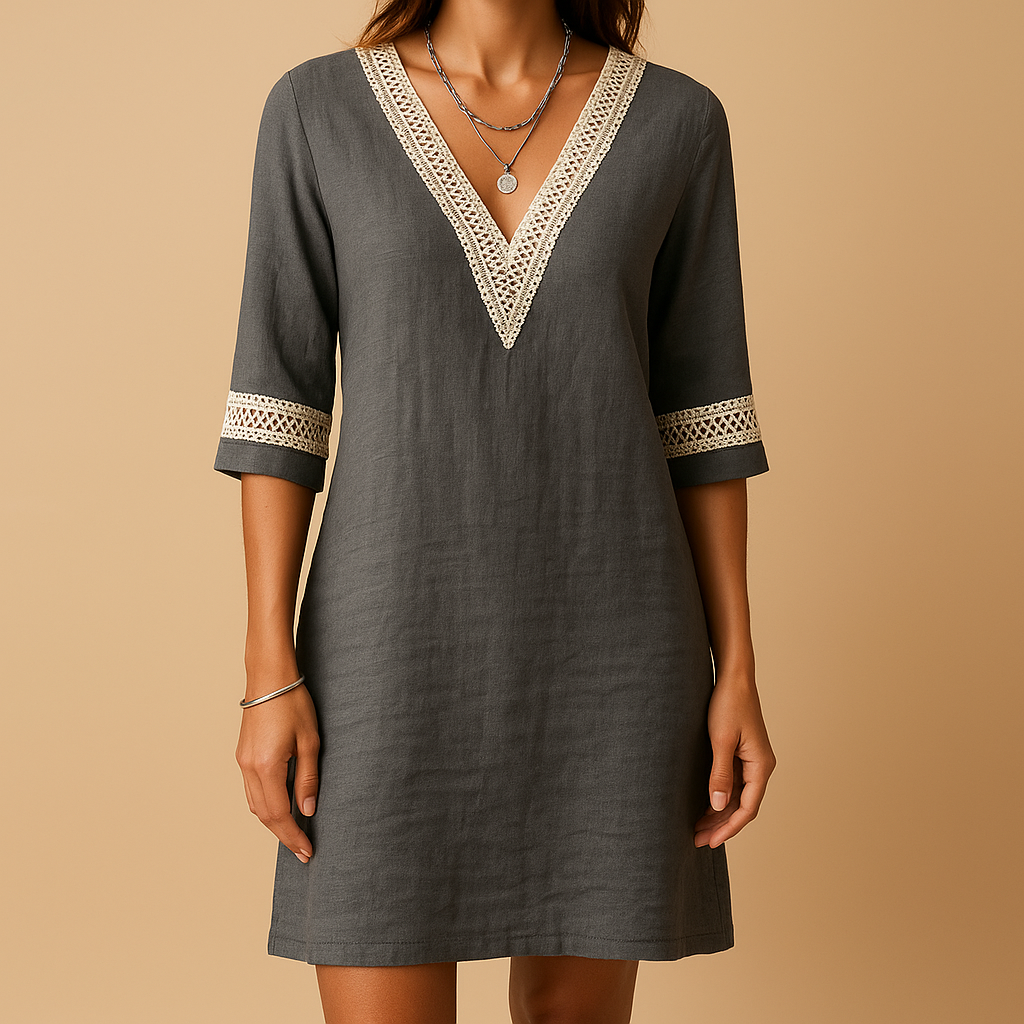 Lichte zomerjurk voor dames met V-hals en kanten details, perfect voor stranddagen en casual zomerlooks.